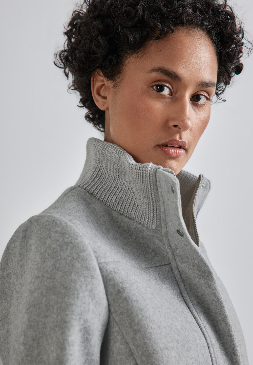 Mantel mit Strickdetails