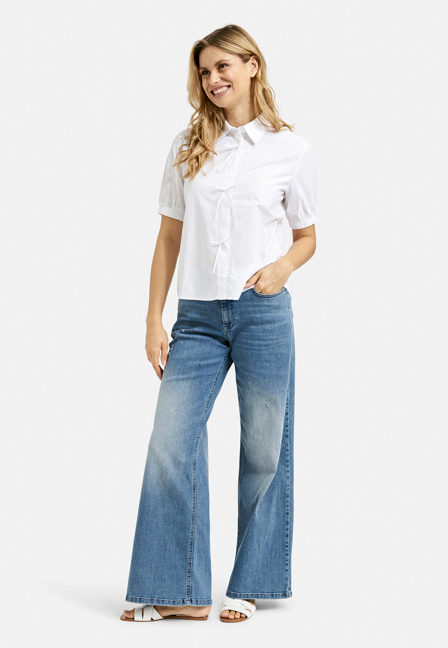 Blouse w collar, placket + bows at cf, 1/2 sleeve w elastic cuff