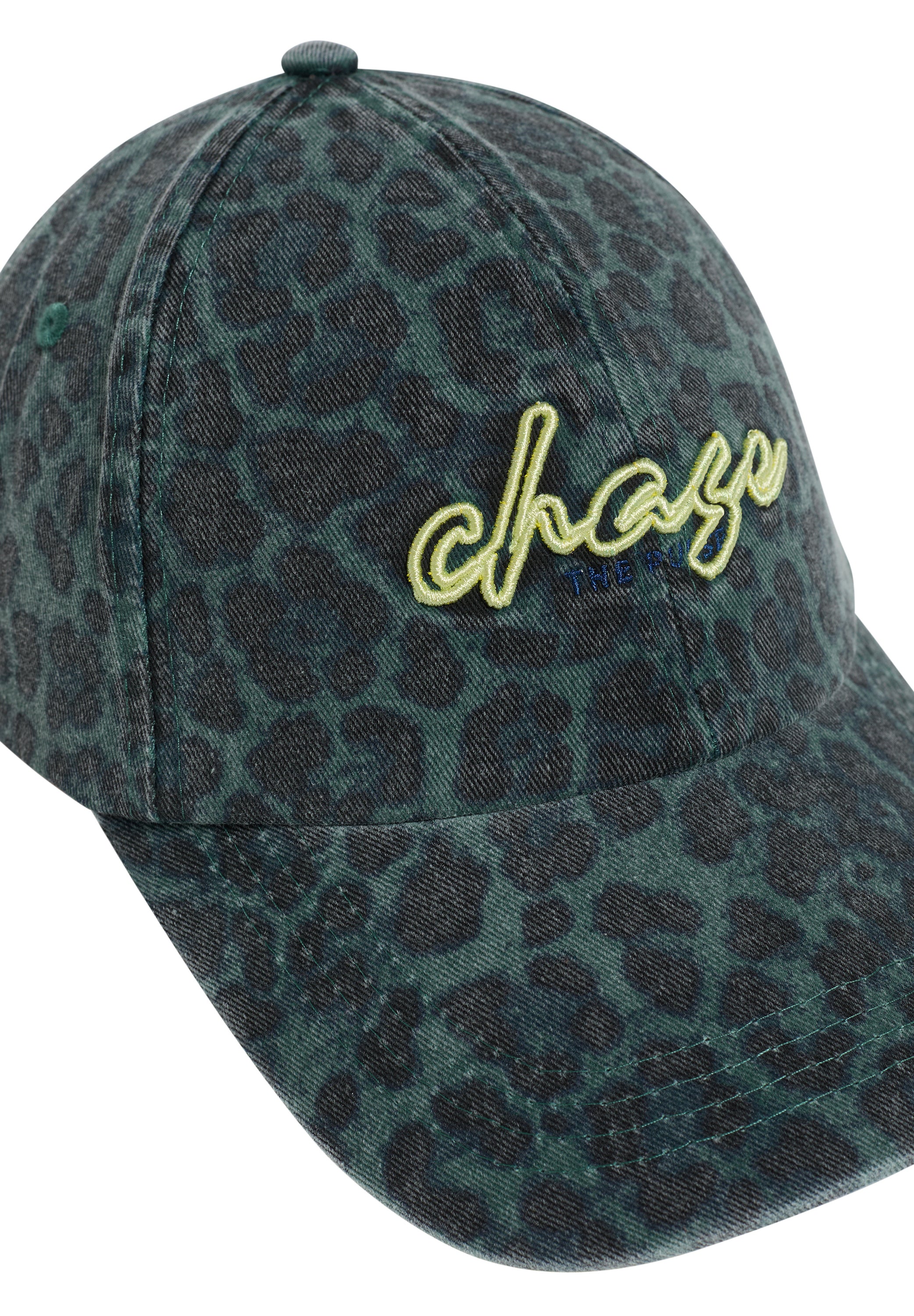 Cap mit Leo-Muster und Slogan